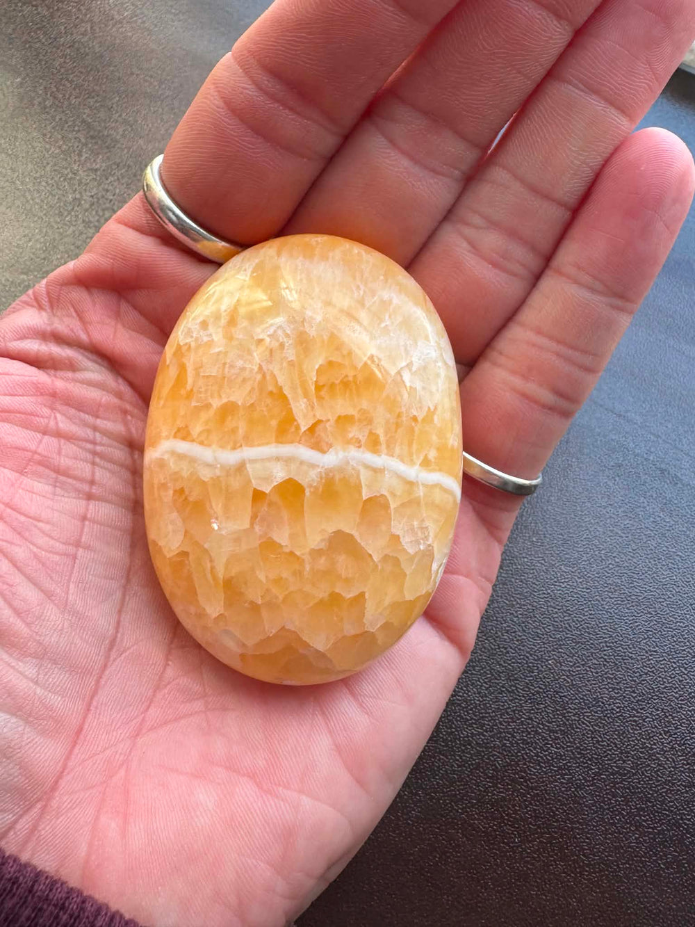 Orange Calcite Palm intuitively pick